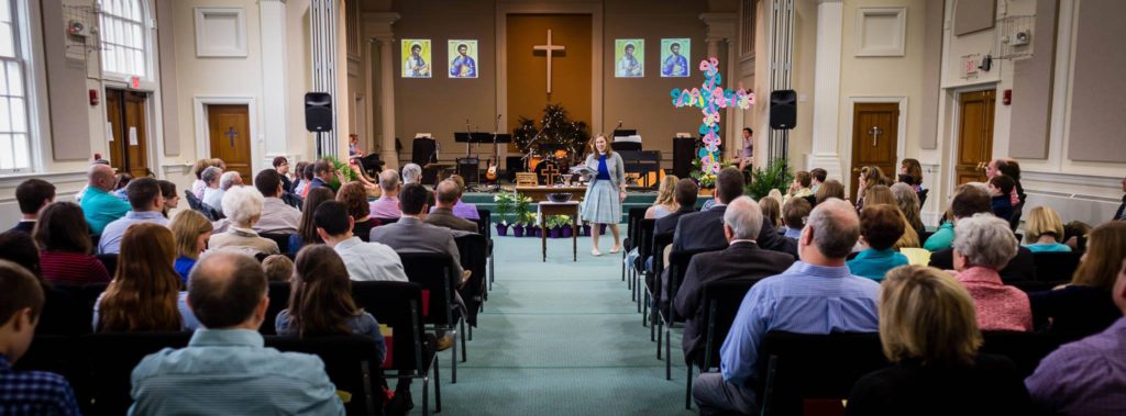 Pastor Sarah preaches at the New Day Praise Service